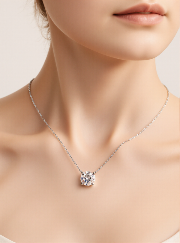 Silver necklace with a moissanite pendant on a mannequin