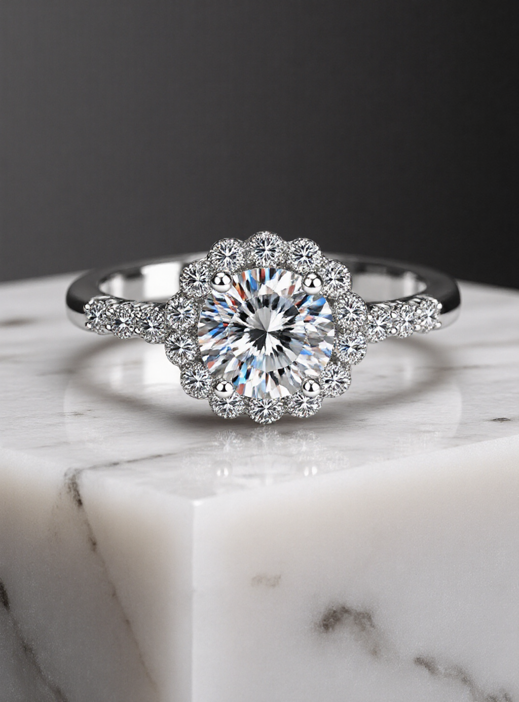 moissanite ring on a marble surface with a dark background